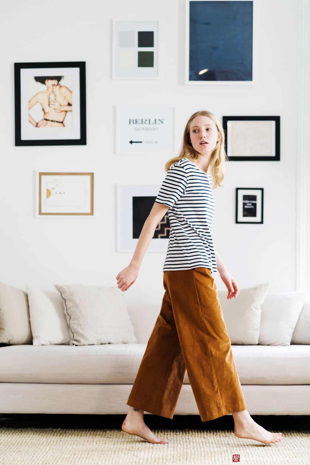 Lookbook photography for Princeton fashion label Semi Gloss NYC winter 2018 collection: black and white striped t-shirt with rust colored velvet pants