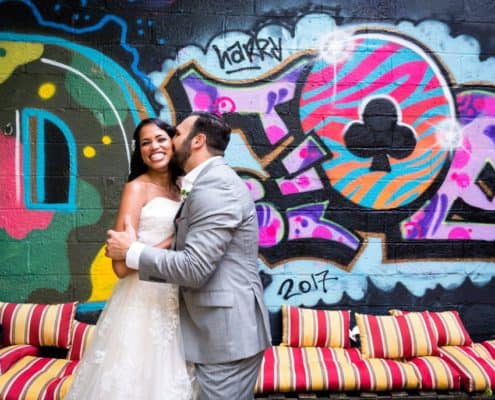 Graffiti wedding photo: Brooklyn portrait at Electric Anvil Tattoo
