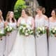 Bride wearing dress from Hearts for You Bridal, bridesmaids dresses by Show Me Your Mumu, flowers by Petal Pushers in Hamilton NJ