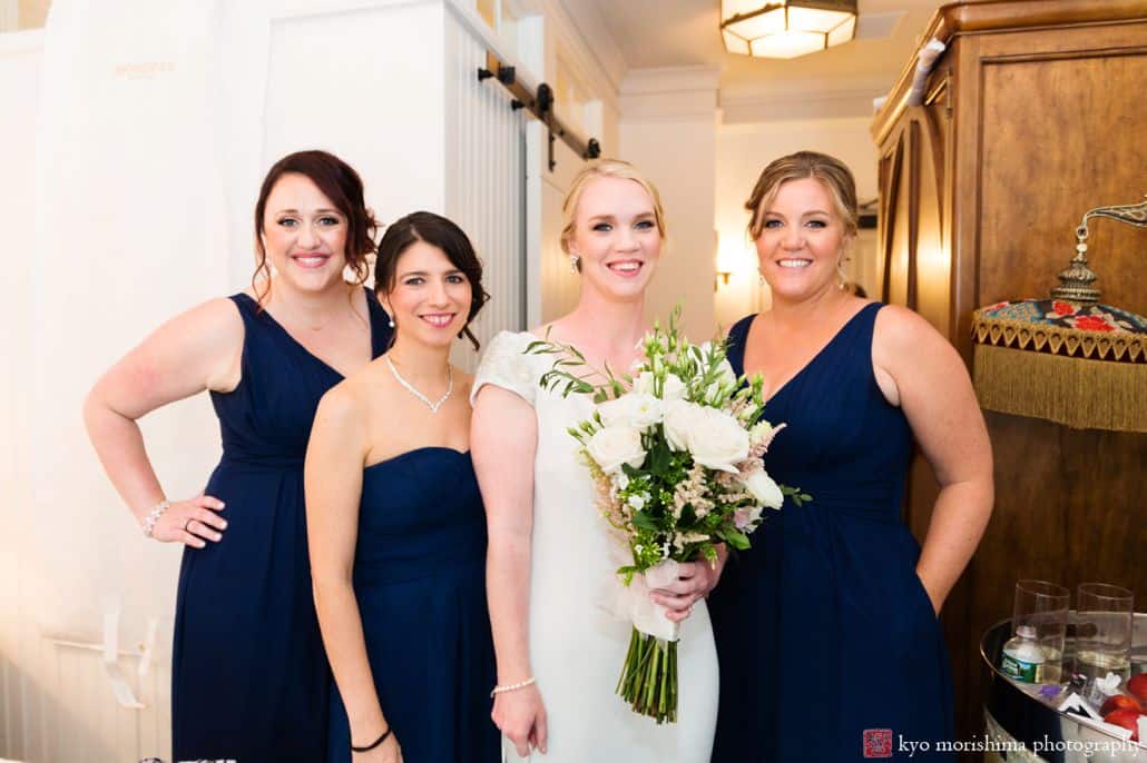 Bride wearing Pronovias and bridesmaids wearing Weddington Way pose with bouquet from JR Floral at Beekman Hotel.