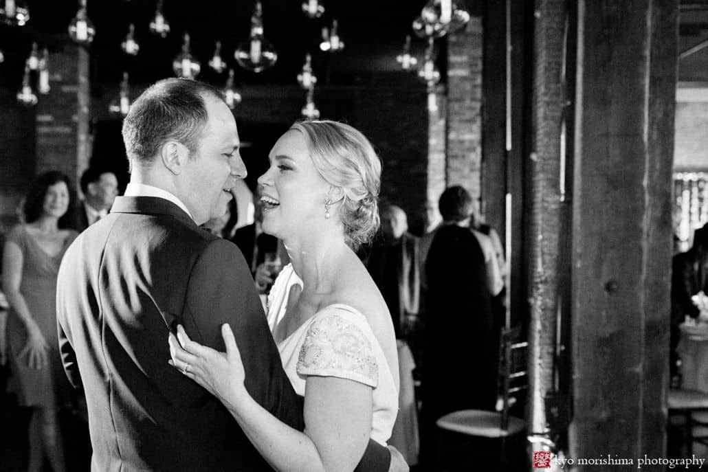 Black and white wedding photography: bride and groom first dance at Liberty Warehouse in Red Hook Brooklyn