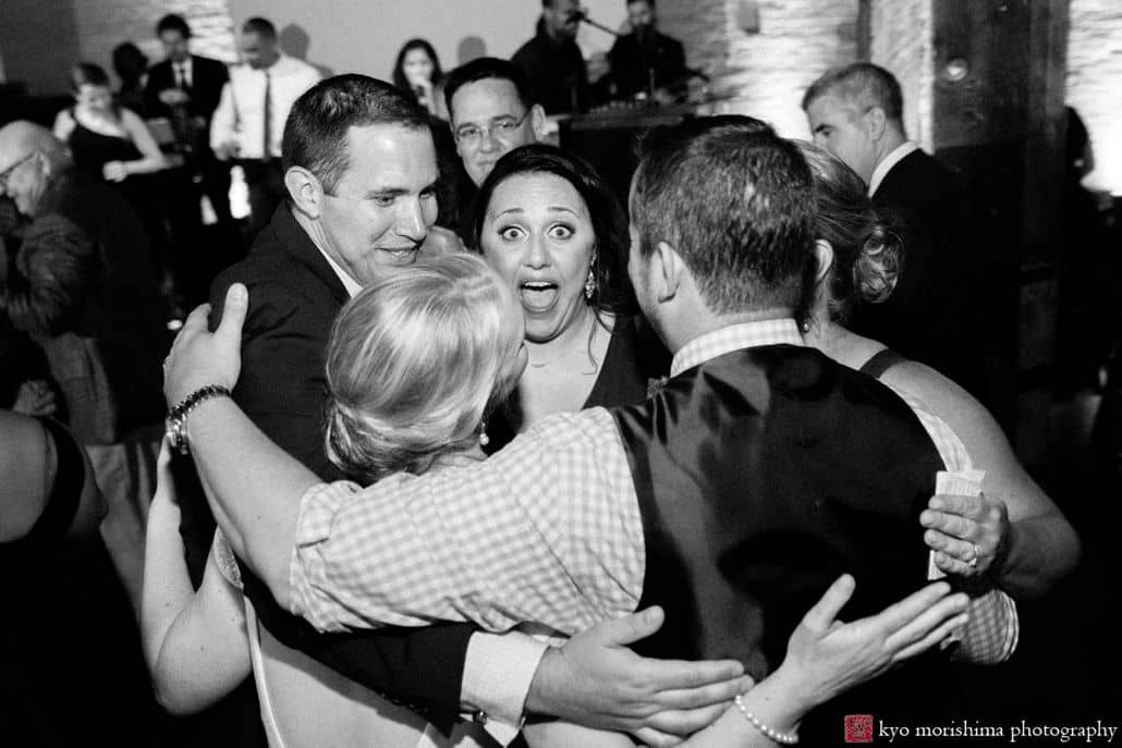 Documentary style wedding photos: guests get into the moment during Liberty House wedding with live music by Hank Lane band.