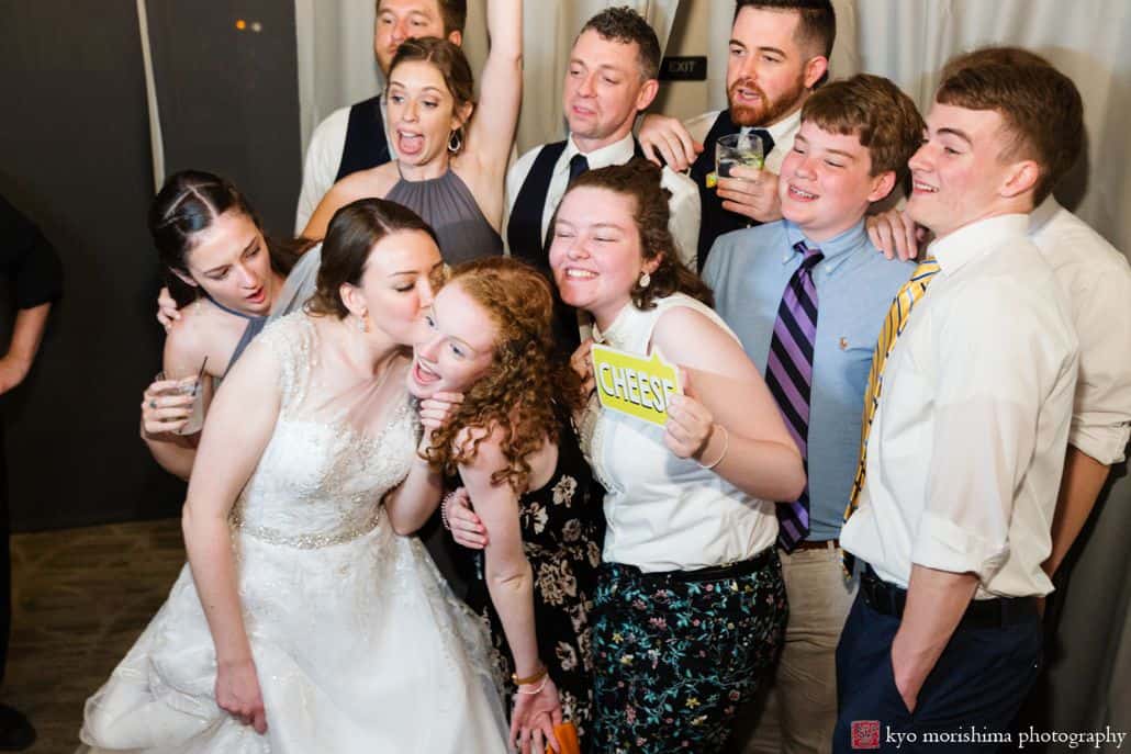 fun and happy wedding picture laughing and smiling fun posed picture all standing around each other bride in front cute and creative wedding picture ideas Late Spring Mercer County Boathouse Princeton NJ Wedding