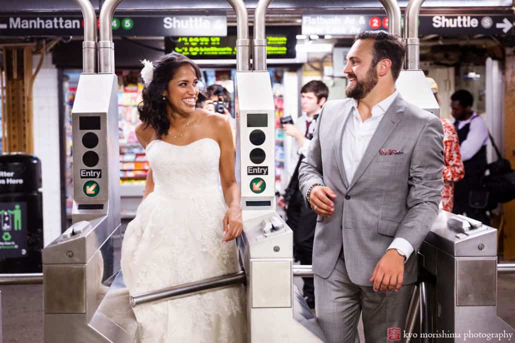 Light-hearted portrait session of a happy groom and bride looking at each other entering the subway, photographed by wedding photographer in central NJ Kyo Morishima.