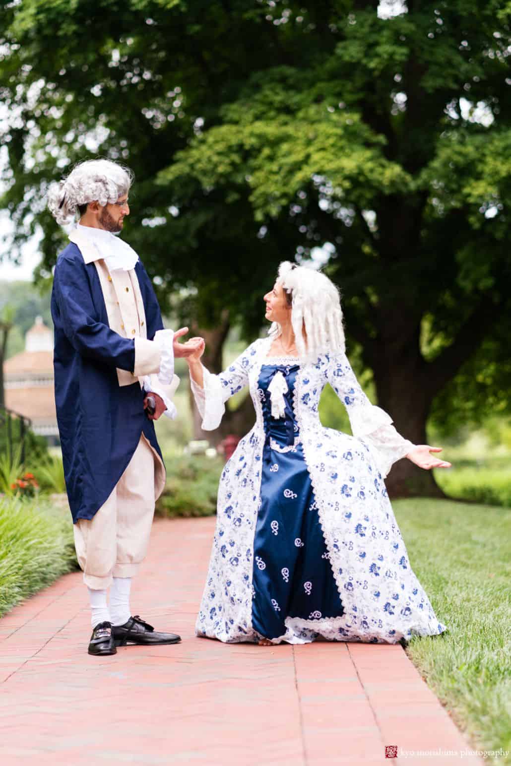 Bride and groom wearing 18th century formal dress and white wigs at Chauncey Center wedding.