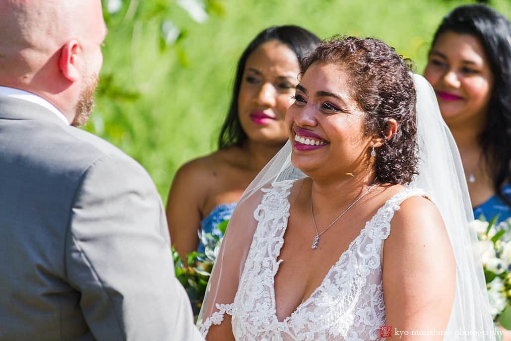 Candid moment during the ceremony: photojournalist wedding photographer NJ Kyo Morishima captures bride's beaming smile