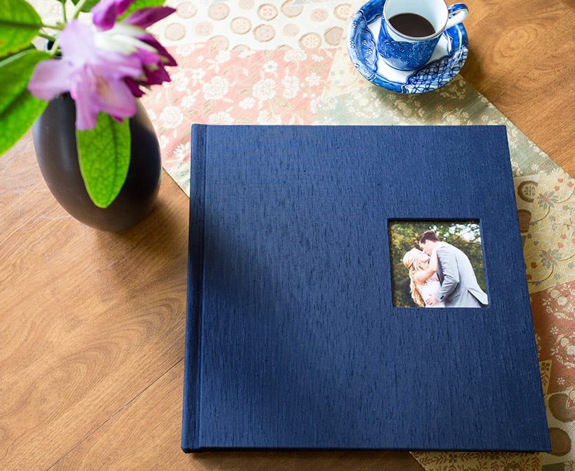 Custom wedding album in navy silk shantung with inset cover photo