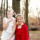 Sweet and silly family portraits, daughters playing together in the park. Relaxed, candid New Jersey family photography.
