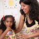 Mother and daughter baking together in a relaxed family photo shoot. NYC child and family photography.