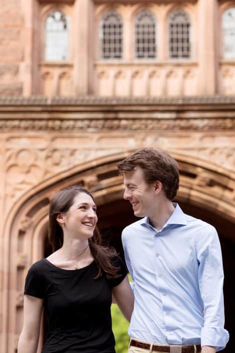 Classic Princeton University engagement photo with Gothic architecture in the background