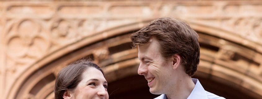 Classic Princeton University engagement photo with Gothic architecture in the background