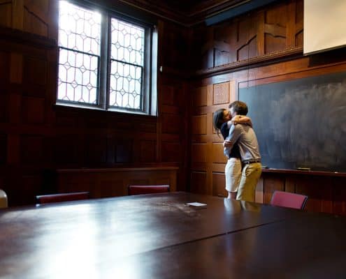 Dramatic kiss in a classroom at Princeton University: unusual engagement photo