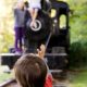 Relaxed family photo shoot, playing on a train at the park. NYC child and family photography.