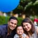 Family fun at the park with balloons. Child and family portraits. Natural, posed, fun New Jersey family photography.