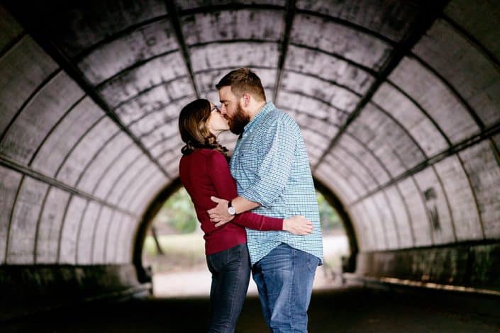 Prospect Park engagement photo - couple kissing inside tunnel