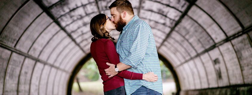 Prospect Park engagement photo - couple kissing inside tunnel