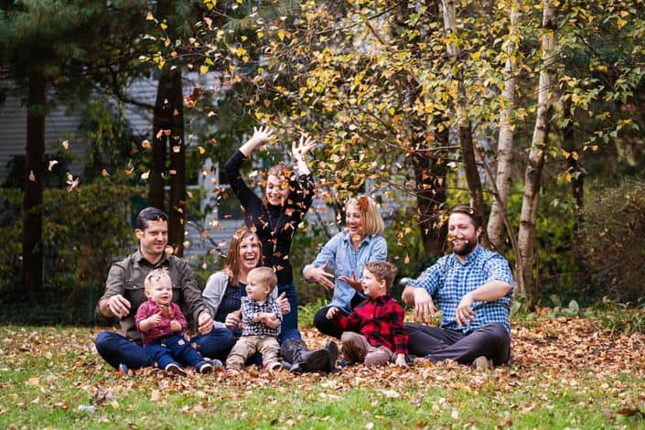 Extended family photo session, outside playing in the leaves. Natural and posed child and family portraits. New Jersey family photography.
