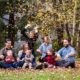 Extended family photo session, outside playing in the leaves. Natural and posed child and family portraits. New Jersey family photography.
