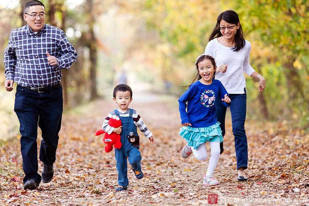Parents Children running playing outside d&r park Kingston New Jersey fall family photo