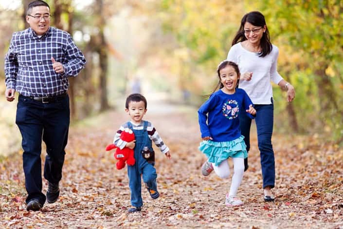 Parents Children running playing outside d&r park Kingston New Jersey fall family photo