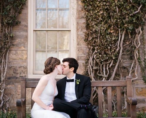 Bride and groom kiss wedding portrait seeing rings Princeton University Chapel New Jersey Wedding by Kyo Morishima Photography