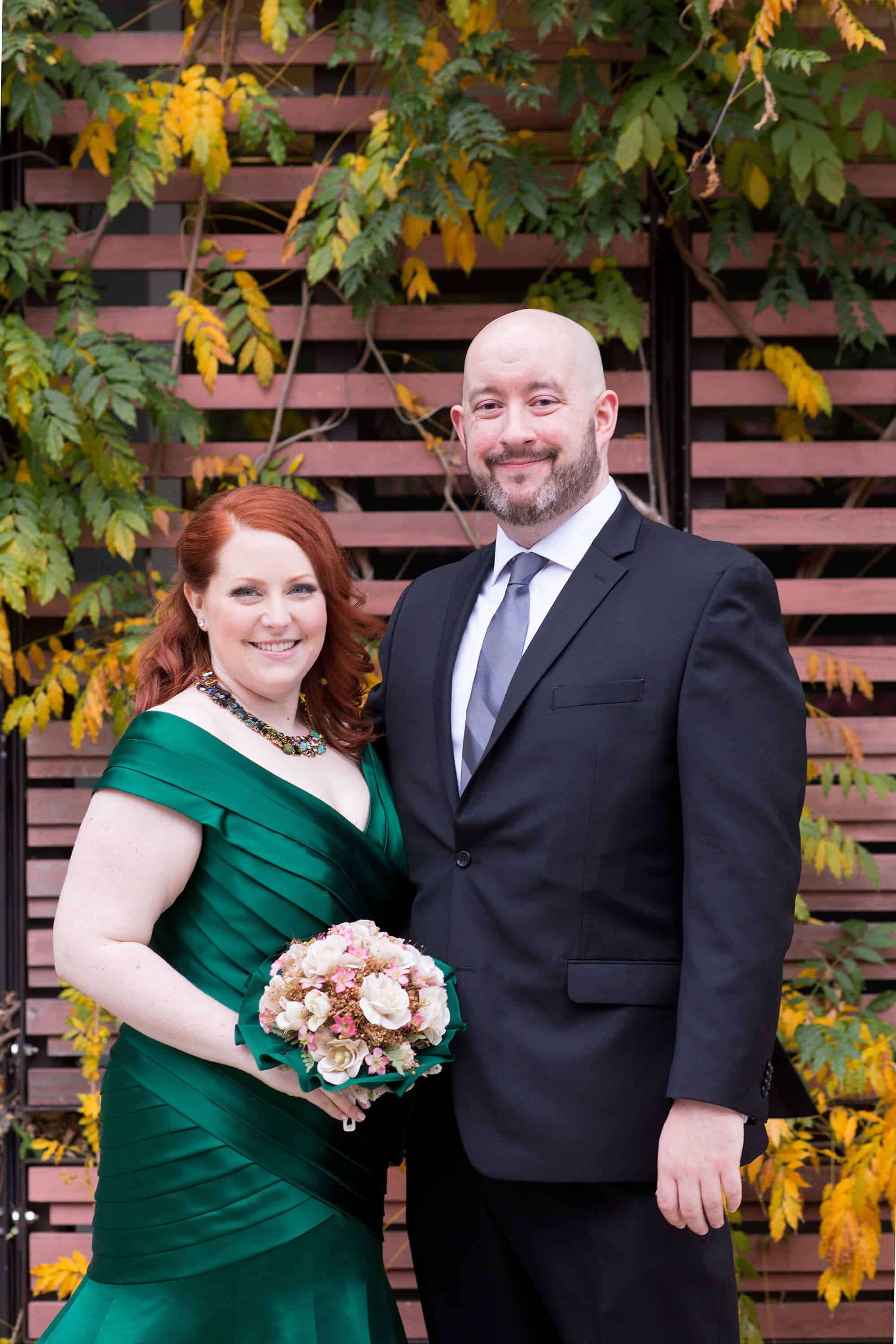 Morris museum nj fall wedding outdoor bride and groom portrait holding hands couple newlyweds