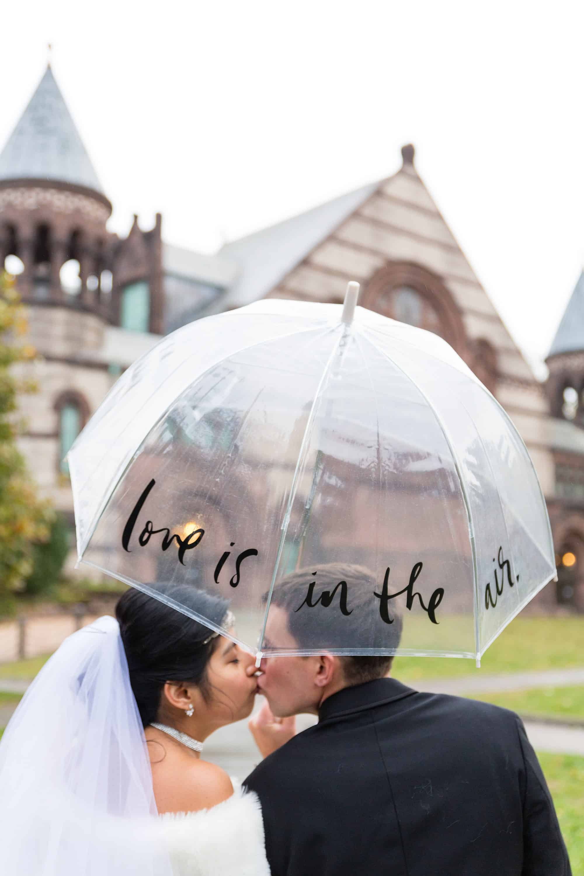 Rainy Day Wedding Tips princeton university portrait clear transparent umbrella love is in the air