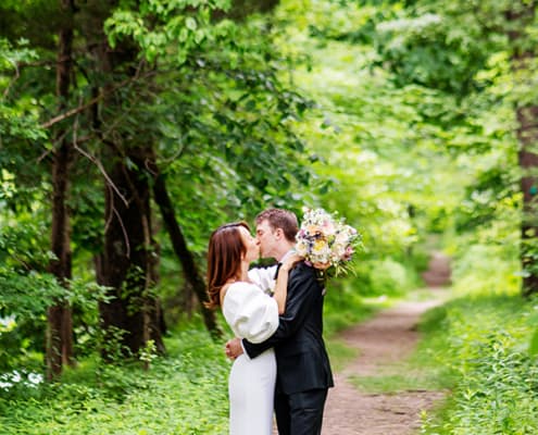 mountain lake house princeton nj woods nature trail bride and groom wedding portrait kiss