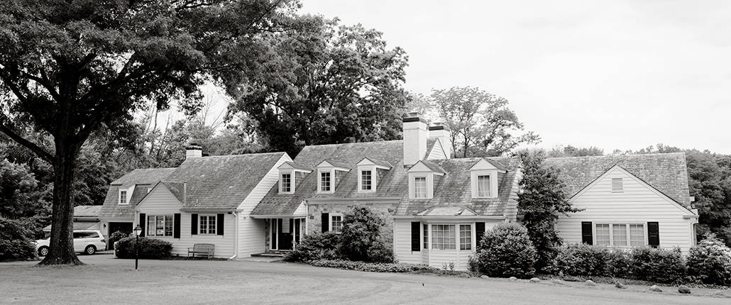 mountain lake house historical stone building princeton nj outdoor wedding venue black and white