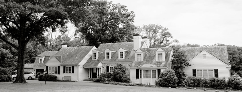 mountain lake house historical stone building princeton nj outdoor wedding venue black and white