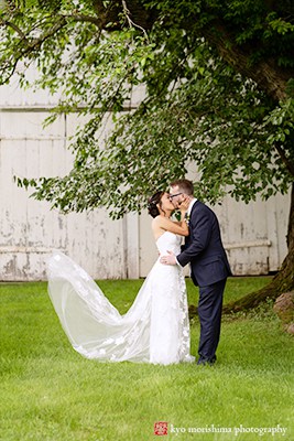Updike Farmstead, Magnolia West Events, Sprouts Flowers, Princeton wedding, field, barn, bride and groom outdoor portrait, kiss, dress flowting in the air