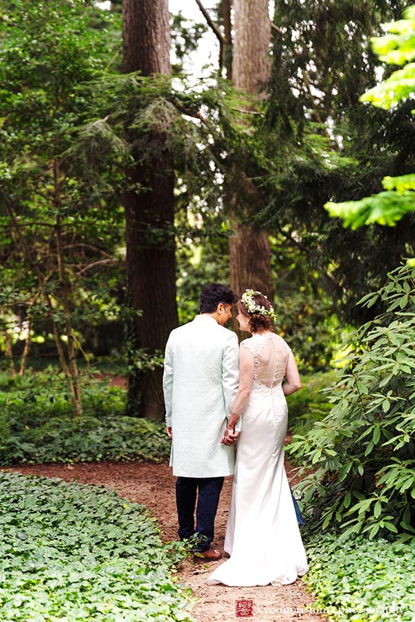 Princeton University Chapel wedding bride and groom portrait walking in woods NJ