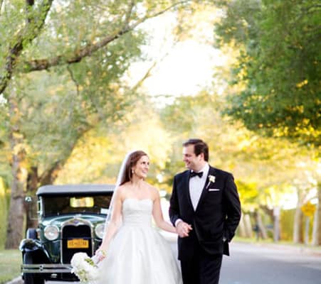 Bride and groom walk vintage historical car Southampton fall outdoor wedding portrait