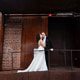 Bride kissed groom in front of Wythe Hotel Brooklyn wedding portrait