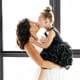 bride and flower girl kissing during getting ready at Wythe Hotel Brooklyn NYC