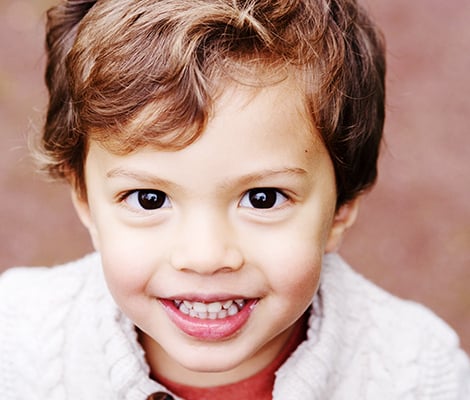 boy white sweater smiling princeton family portrait