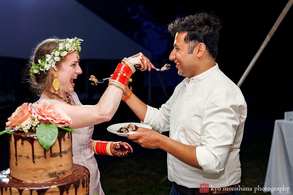 bride and groom cutting cake at Manor House Princeton NJ Hindu wedding reception