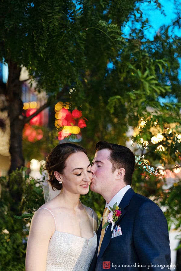 Chelsea street bride and groom wedding night portrait kiss NYC