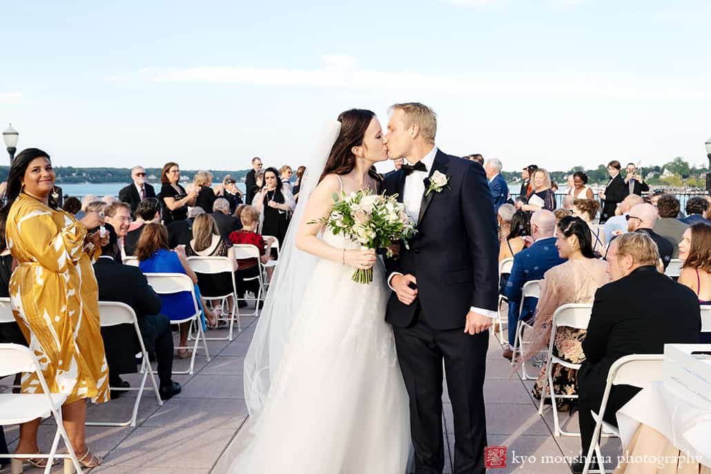 Molly Pitcher Inn Red Bank bride and groom bay ocean wedding ceremony kiss