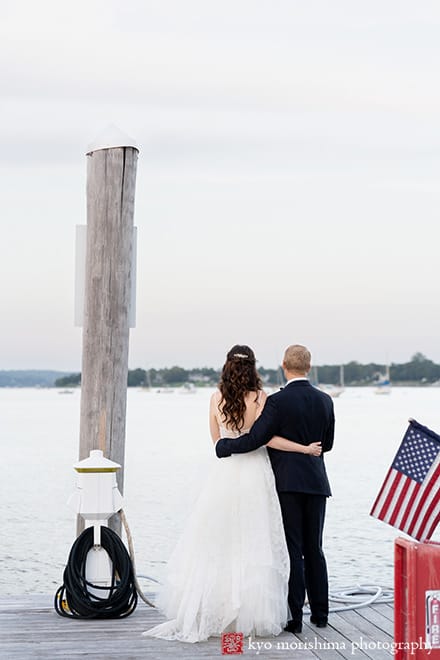 Molly Pitcher Inn Red Bank bride and groom bay ocean wedding portrait hug on a dock