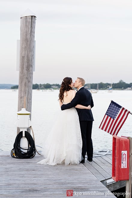Molly Pitcher Inn Red Bank bride and groom bay ocean wedding portrait kiss on a dock