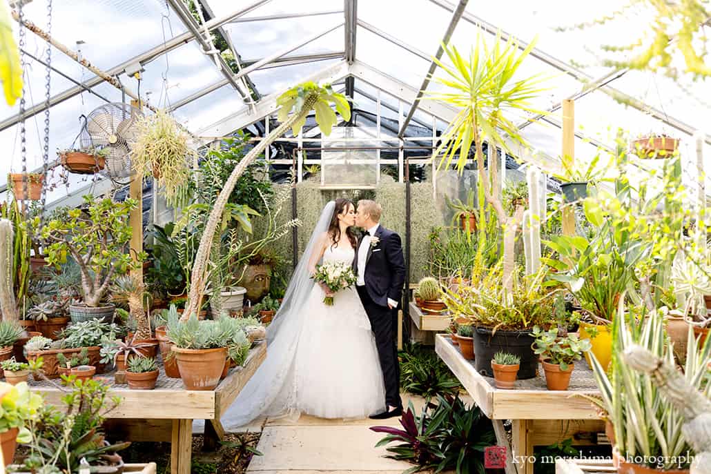Deep Cut Gardens Monmouth County Park bride and groom green house kiss wedding portrait