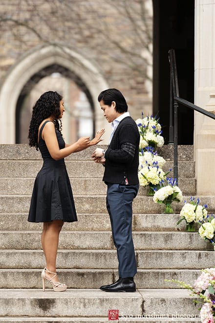 Viburnum Designs Princeton University alumni proposal portrait putting an engagement ring on