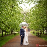 bride and groom, outdoor, portrait, restaurant, Princeton, NJ, wedding, rainy day, smiling, newlyweds, couple, umbrella kiss
