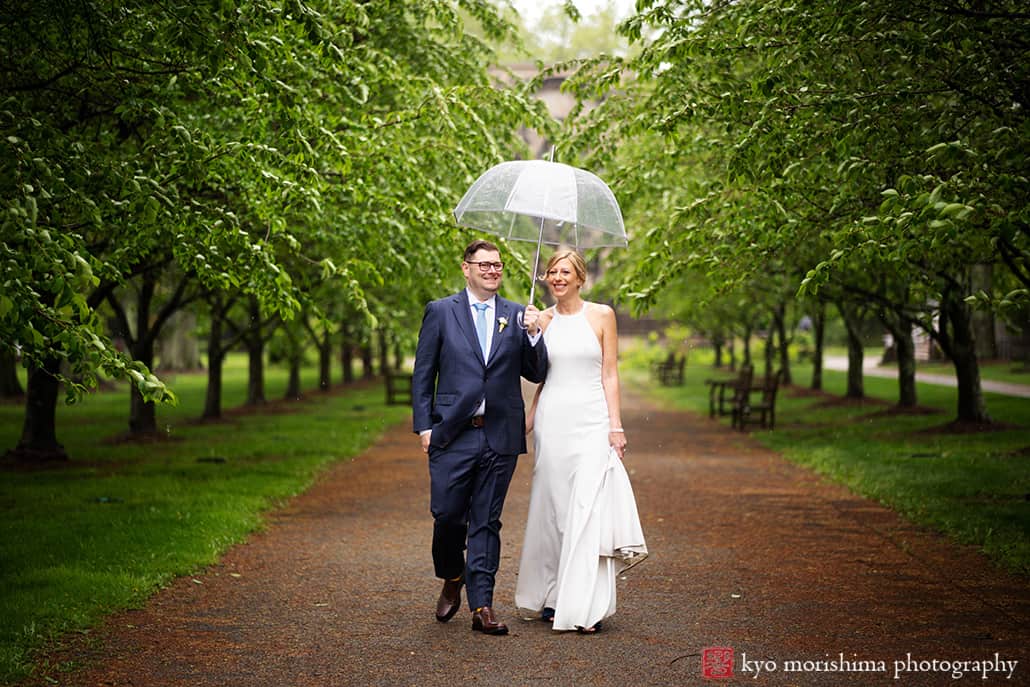 bride and groom, outdoor, portrait, restaurant, Princeton, NJ, wedding, rainy day, smiling, newlyweds, couple, umbrella