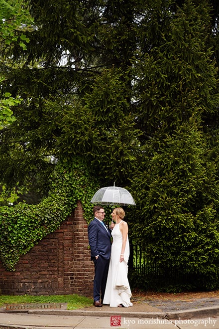 bride and groom, outdoor, portrait, restaurant, Princeton, NJ, wedding, rainy day, smiling, newlyweds, couple, umbrella
