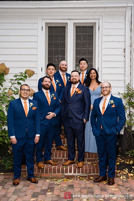 at Fall The Inn at Fernbrook Farm Chesterfield NJ Wedding groom and his bridal party groomsmen and grooms woman smiles group posed outdoor portrait