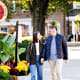 fall autumn Princeton Palmer Square NJ engagement proposal couple outdoor portrait photography session talking a walk holding hands