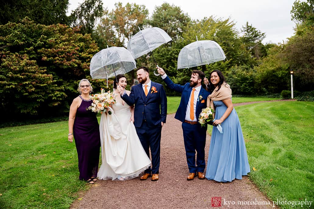 Fall The Inn at Fernbrook Farm Chesterfield NJ Wedding bride and groom portrait in rain romantic moody umbrellas
