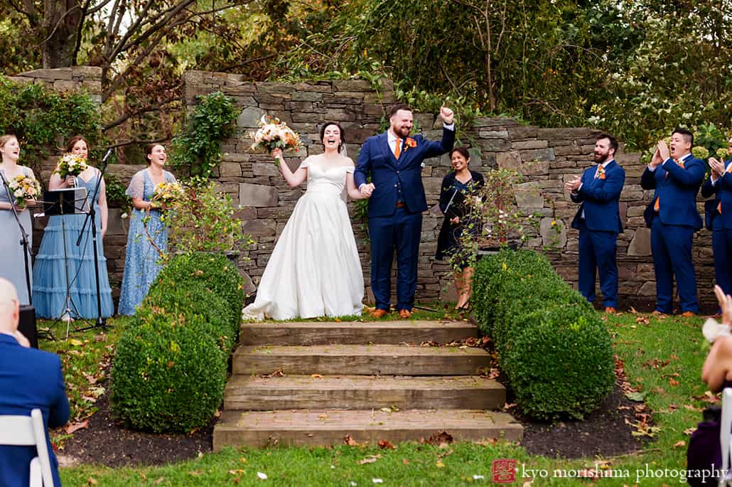 Fall The Inn at Fernbrook Farm Chesterfield NJ Wedding ceremony bride and groom raising their hands and celebrating